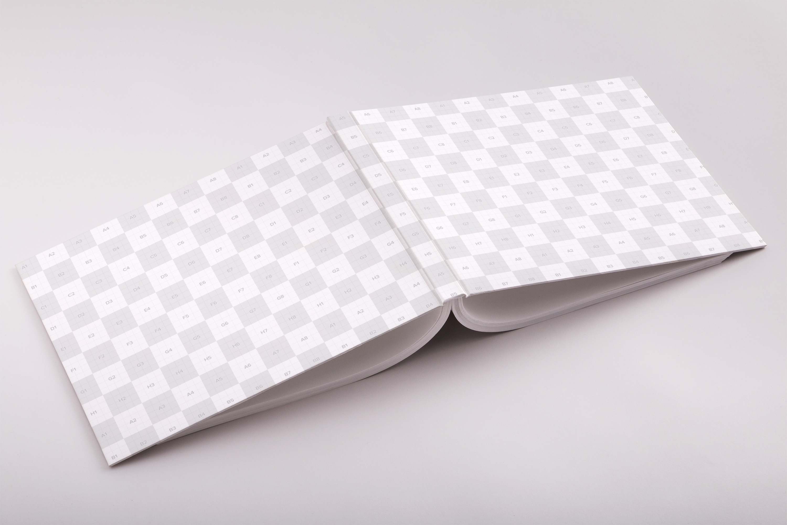 精装图书画册封面封底设计效果图PSD样机04 Hardcover Standard Landscape Book PSD Mockup 04插图(1)