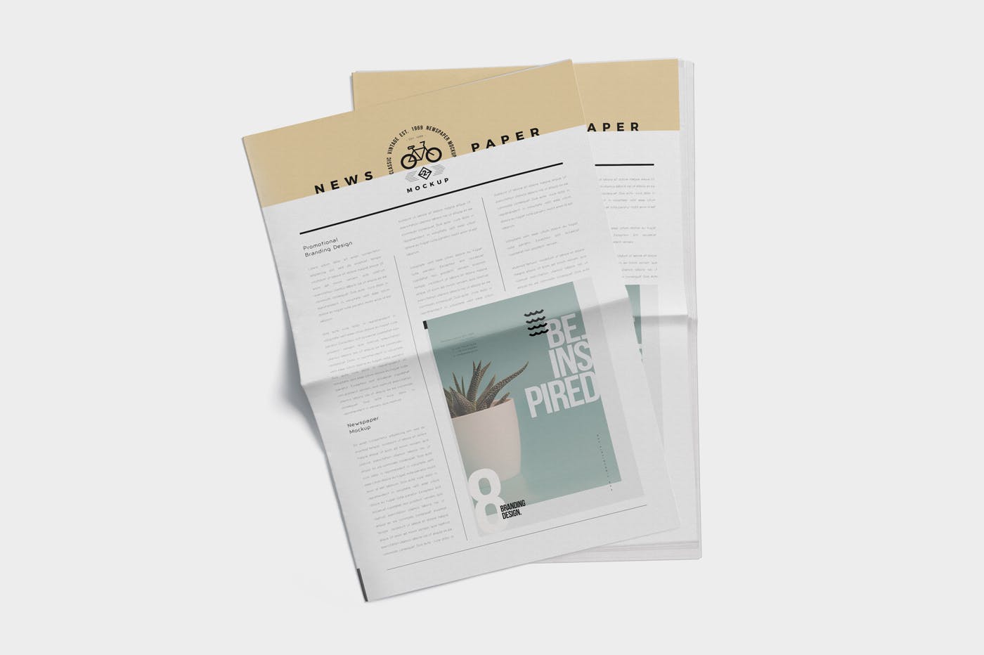 报纸排版设计图多角度预览样机模板 Tabloid Size Newspaper Mockups插图(2)