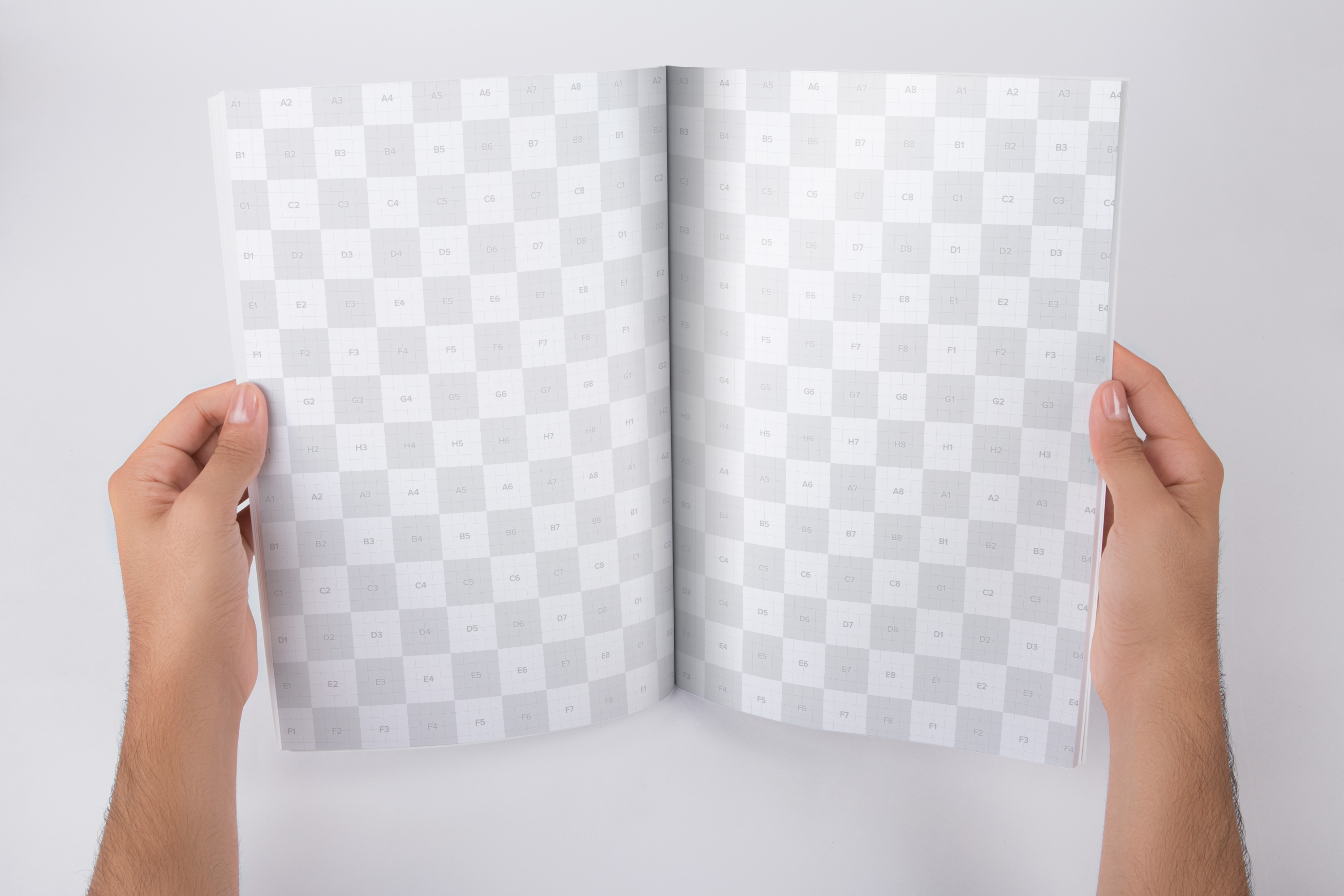 手持A4大小杂志内页版式设计打开效果图样机 Holding A4 Magazine Opened Mockup插图(2)