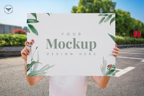 男子展示海报设计效果图样机素材库精选 Man Presenting Poster Mockup