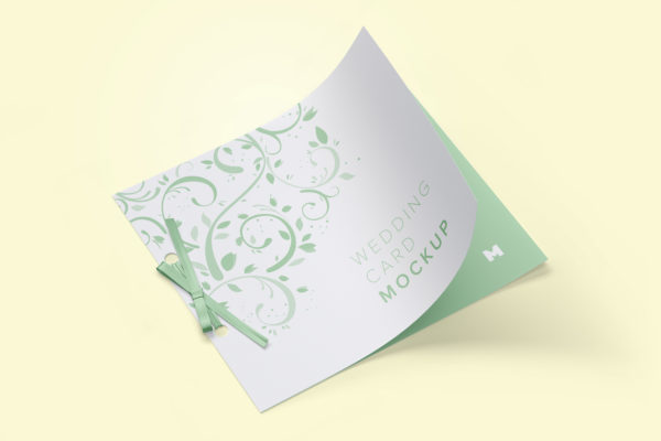 带丝带蝴蝶结婚礼邀请函设计效果图样机 Wedding Card Mockup with Ribbon Bow
