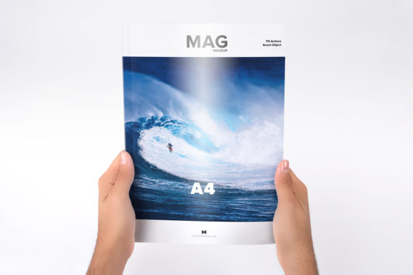 手持杂志场景A4杂志封面设计样机 Holding Closed A4 Magazine Mockup